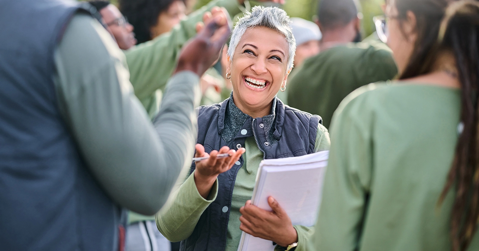 A woman talking in a crowd