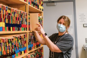 Medical Records Photo of a staff member filing